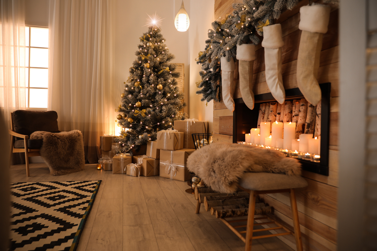 a cozy living room with laminate and christmas decorations