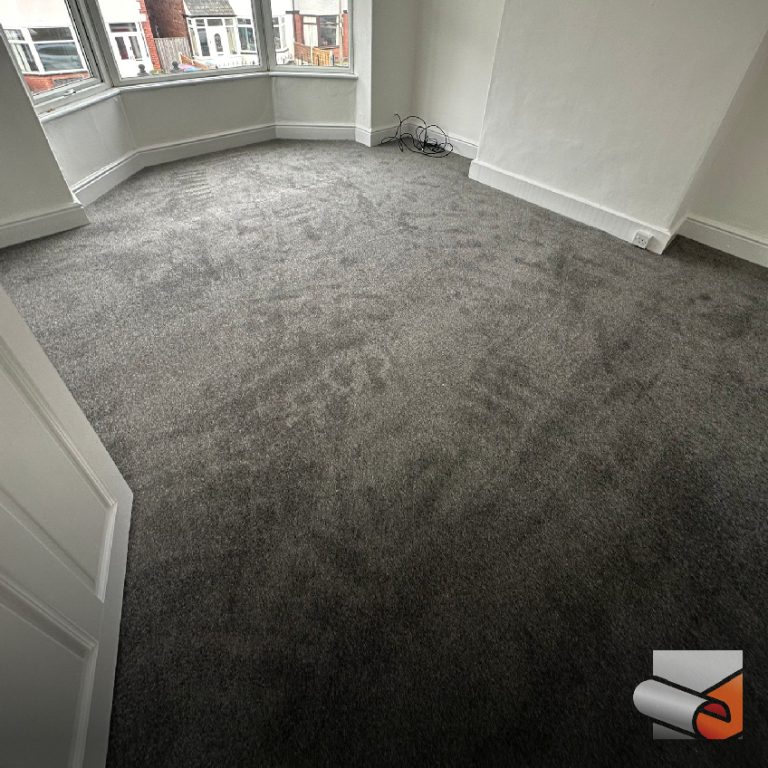 Floor Express Watermark BannersCarpet 19 Carpets Manchester Grey carpet fitted in a bedroom by Floor Express