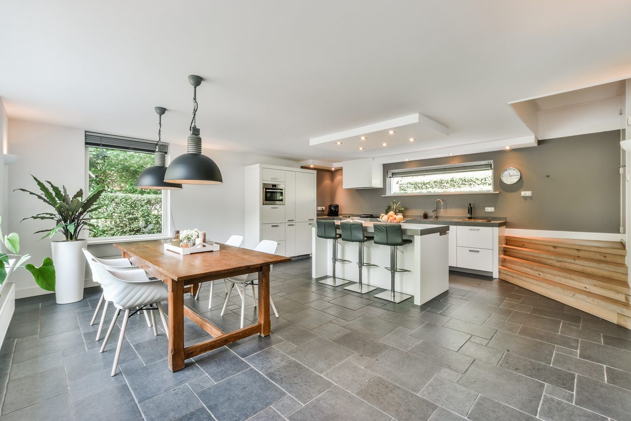 a modern kitchen with luxury vinyl tiles LVT flooring