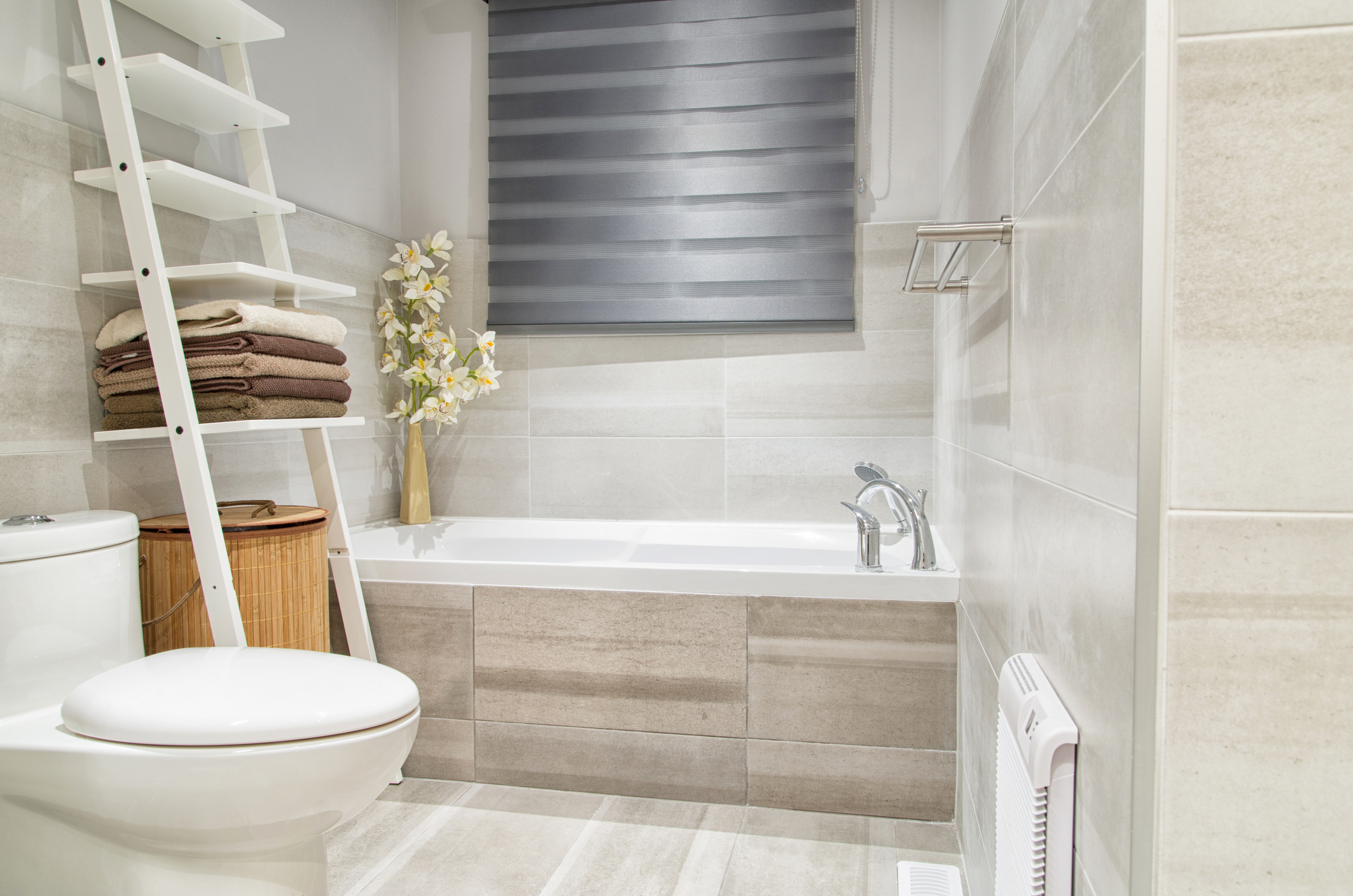 a modern bathroom with wood look tile alternatives