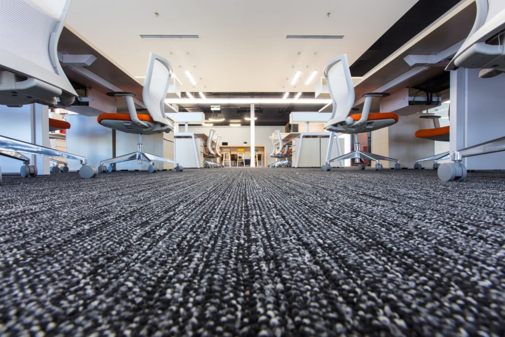 a small office with commercial carpet flooring Carpets Manchester Commercial carpet in a small office